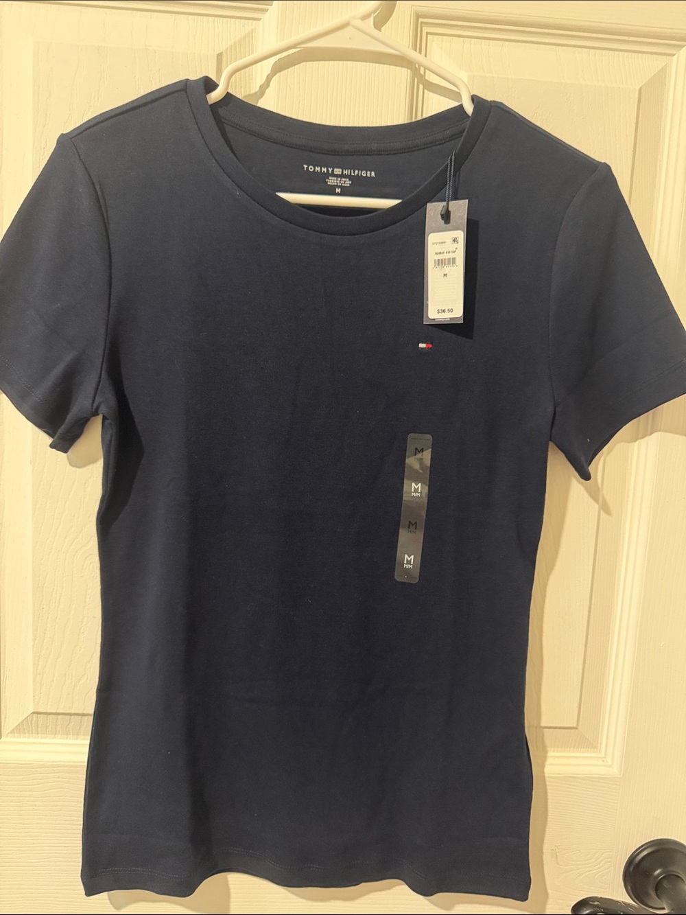 Tommy Hilfiger navy short sleeve crewneck tee with flag logo